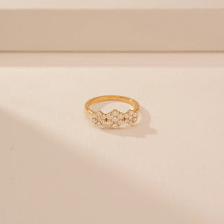 Top view of Charming Blossom Diamond Band Ring in 14KT Yellow Gold, featuring round lab-grown diamonds in floral motifs.