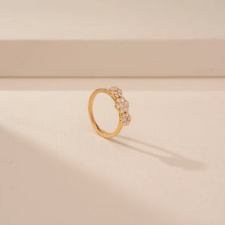 Angled view of Charming Blossom Diamond Band Ring in 14KT Yellow Gold, featuring round lab-grown diamonds in floral motifs.