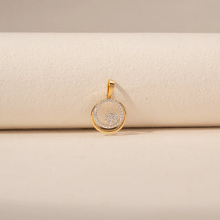 Front view of Round Diamond Circle Pendant in 14KT Yellow Gold, featuring a pavé diamond circle and floating diamond cluster.