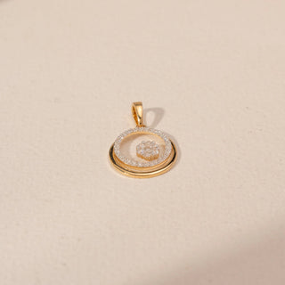 Top view of Round Diamond Circle Pendant in 14KT Yellow Gold, featuring a pavé diamond circle and floating diamond cluster.