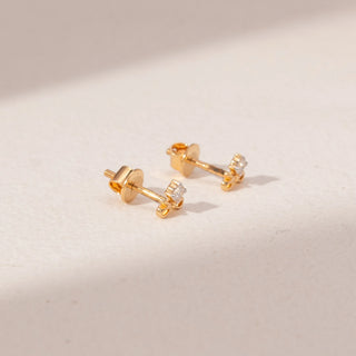 Side view of Bow Diamond Earrings in 14KT Yellow Gold, featuring round lab-grown diamonds with delicate bow designs.