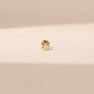 Front view of Sunburst Diamond Nosepin in 14KT Yellow Gold, featuring a round lab-grown diamond and gold rays.
