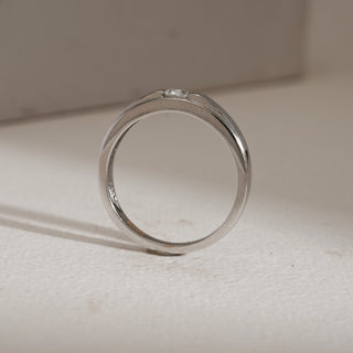 Side view of Men’s Sleek Diamond Engagement Ring photographed against beige background. Designed in 14KT hallmarked white gold, size 20, with EF VVS lab grown diamond totaling 0.257 carats. Ring weighs 4.37 grams and is priced between INR 15,000–50,000.